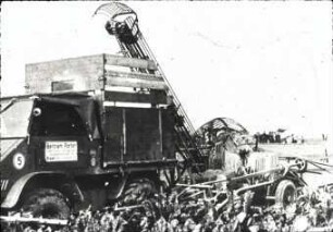 Zweireihiger Köpfroder "Rational" mit Unimog-Seitenkipper