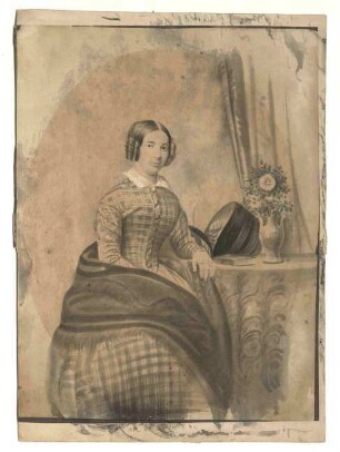 Portrait von Lulu Le Page Renouf, sitzend am Tisch