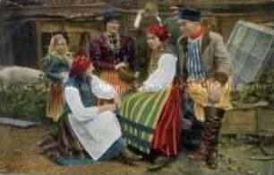 Mann, Frauen und Kinder in russisch-polnischer Volkstracht (zweisprachig)