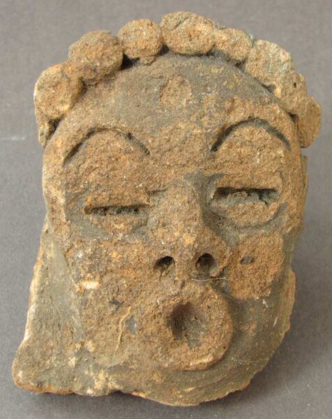 Clay head (vessel fragment)