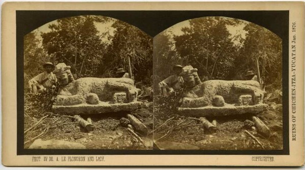 Stone sculpture of a jaguar with a human head.