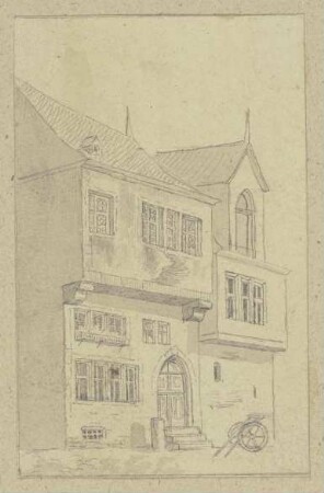 Stadthaus mit Handkarren
