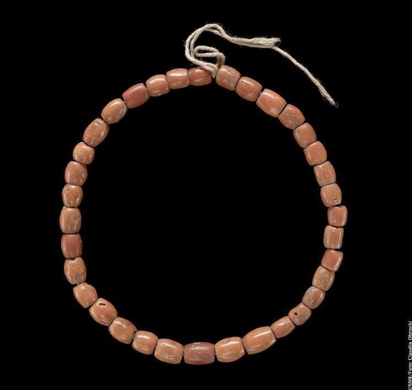 Cord with coral beads