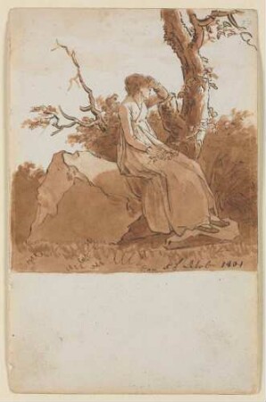 Auf einem Felsen sitzende Frau