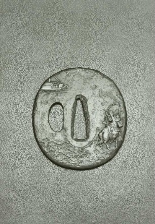 Tsuba (Stichblatt) mit schießendem Krieger