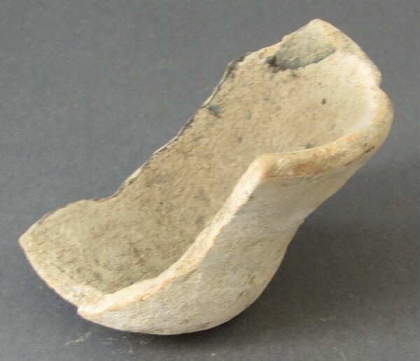 Fragment of a clay vessel