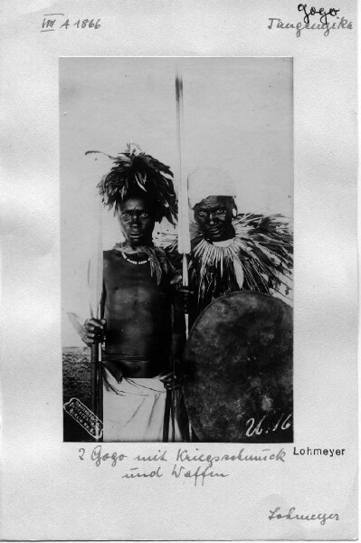 Two gogo in war jewellery and weapons