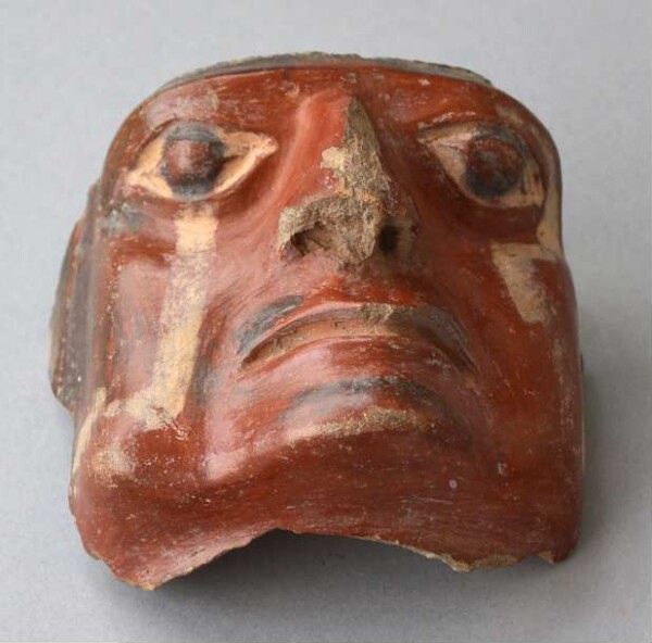 Fragment d'argile (visage en argile)