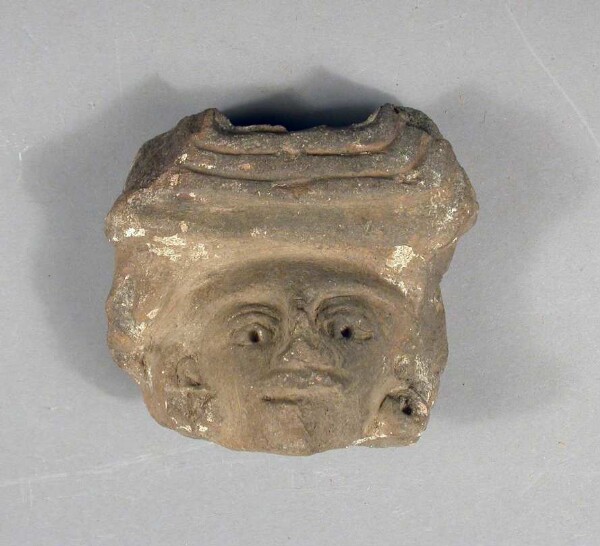 Fragment of a clay vessel