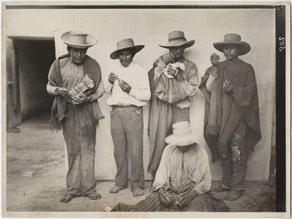 Group of men from Otuzco Santiago de Chuco, chewing coca