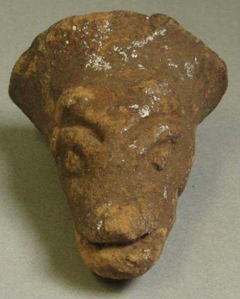 Clay animal head (vessel base)