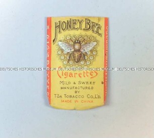 Zigarettenschachtel „Honey Bee“, geöffnet, flachgedrückt, ohne Inhalt