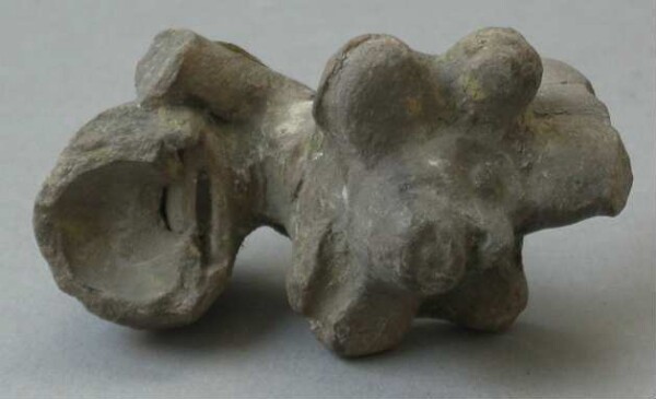 Fragment of a clay rattle (clay head)