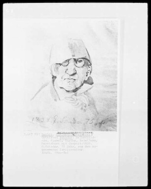 Brustbild von vorn mit Brille und Schirm