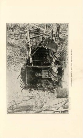 Plate XXXVIII. Negrito man, wife, and hut, Batan