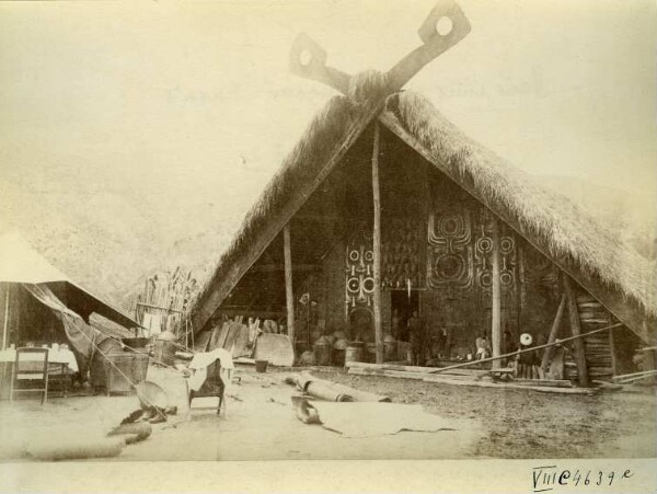 House with utensils in front of the house