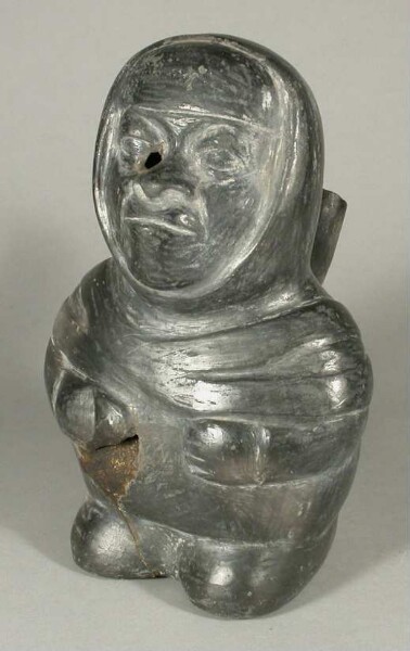 Kneeling anthropomorphic figure