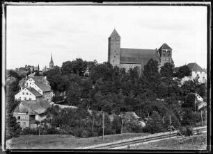 Rastenburg (Ketrzyn/Polen). Stadtansicht mit Eisenbahnlinie, Kirche und Ordensburg