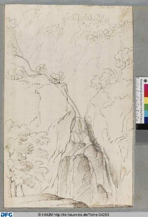 Schlucht mit Wasserfall in eienr Berglandschaft