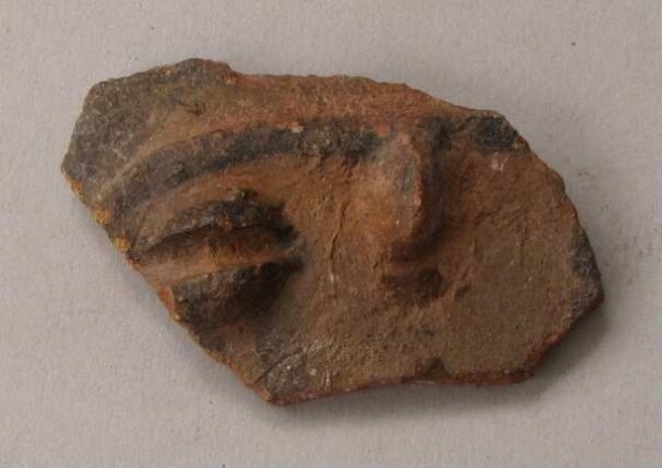 Figurine en argile (fragment)