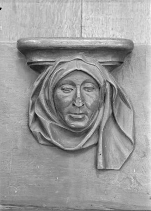 Erste Misericordie: Frauenkopf