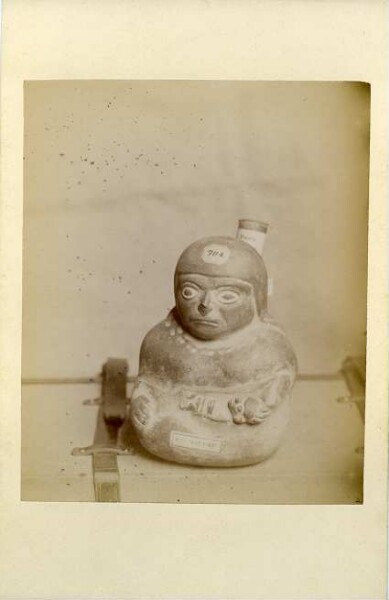 Clay vessel in the shape of a seated woman with child (V A 4193)