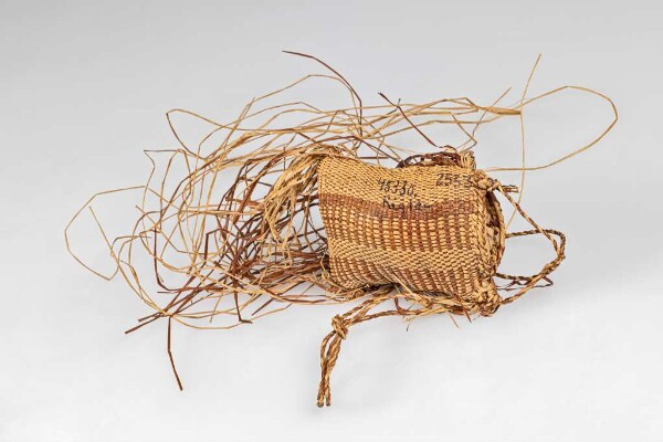 Small raffia bag with contents