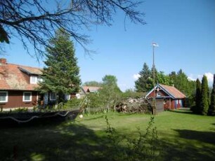 Preila: Kurische Holzhäuser