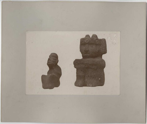 Idol from Tezontle, depicting a mountain god, found on 16 October in Calle de las Escalerillas. (right) Small stone figure. (left)