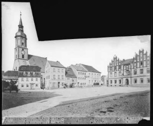 Mügeln. Marktplatz und "Fliegender Mann"
