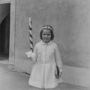 Kommunion : Portrait eines Mädchens anlässlich der Kommunion