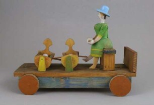 Bemalter Wagen mit Kinderwiegen
