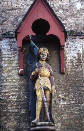 Xanten - Holzfigur eines Schutzheiligen : Figur eines Schutzheiligen. Aufgenommen in Xanten 2001