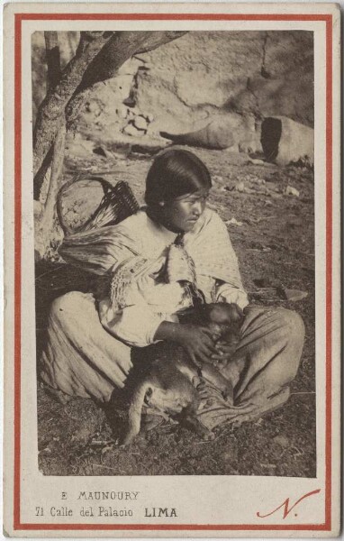 Indian woman with carrying basket and dog