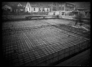 Baustelle im Bereich der heutigen Stadtwerke/ehemalige Milchzentrale mit Blick auf andere Häuser