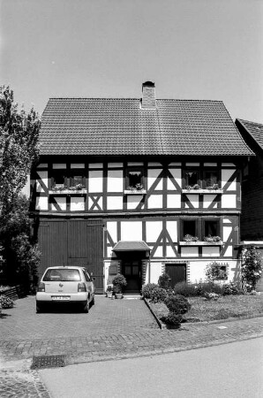 Wohnhaus (Einhaus, Fachwerk); Burgwald, Rotlehm 13