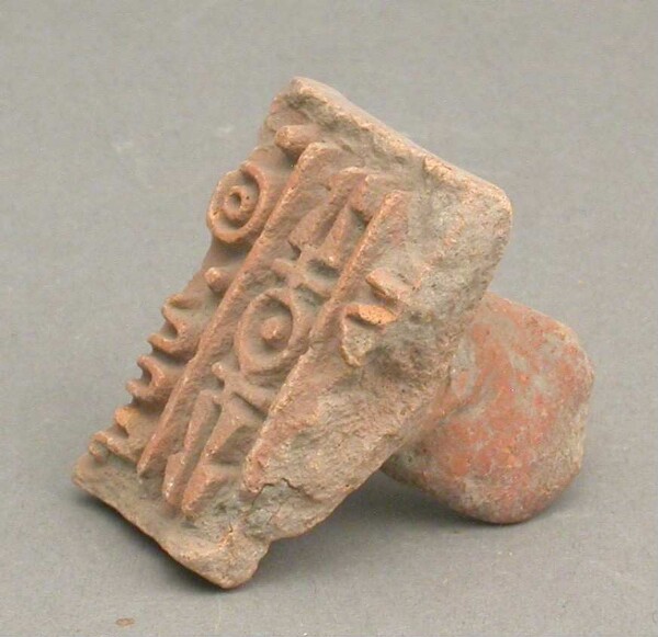 Tampon d'argile (fragment)