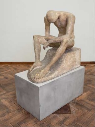 Sitzender Jüngling