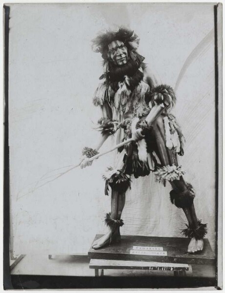 Exhibition mannequin decorated with objects from the Chamacoco ("Osiuta players")