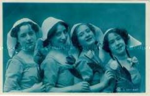 Postkarte mit vier tulpentragenden Frauen