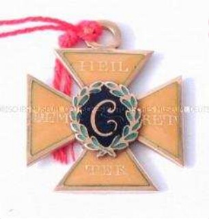 Emaillekreuz in Goldfassung