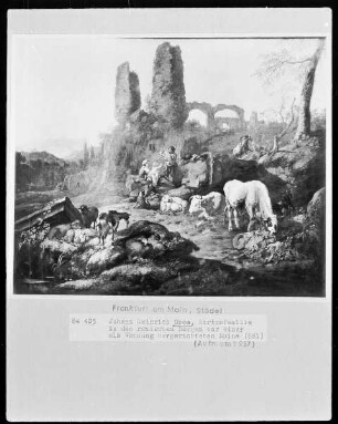 Hirtenfamilie in den römischen Bergen vor einer als Wohnung hergerichteten Ruine