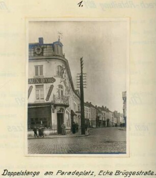Foto einer Doppelstange für die Fernsprechleitungen am Paradeplatz, Ecke Brüggestraße in Menen (Menin)
