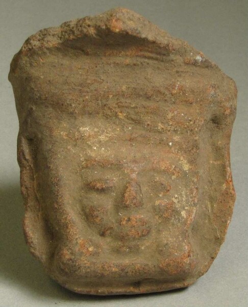 Clay face as vessel base