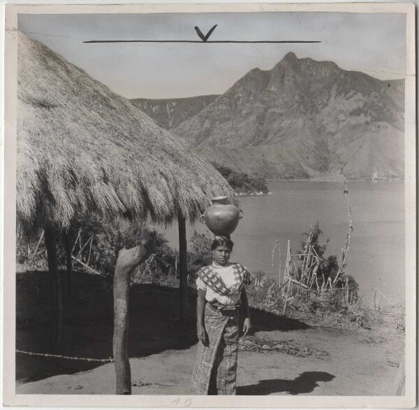 Woman with clay jug on her head