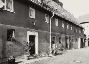 Mobschatz-Brabschütz, Dorfplatz 4. Bauernhof. Wohnstallhaus (bez. 1801)