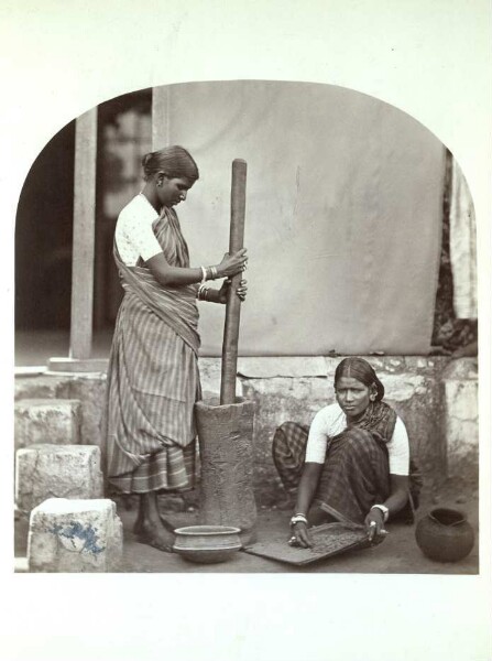 Women pounding rice