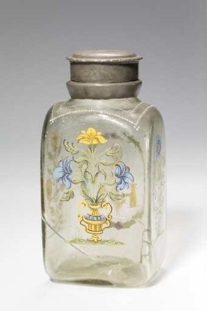Glasflasche mit Monogramm und Blütenstauden