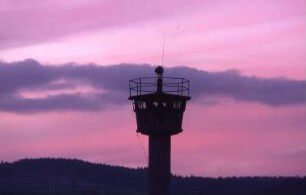 DDR-Postentrum vor Abendhimmel im Bereich Bayern, ca. 1985