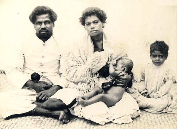 "Fijian teacher with family"